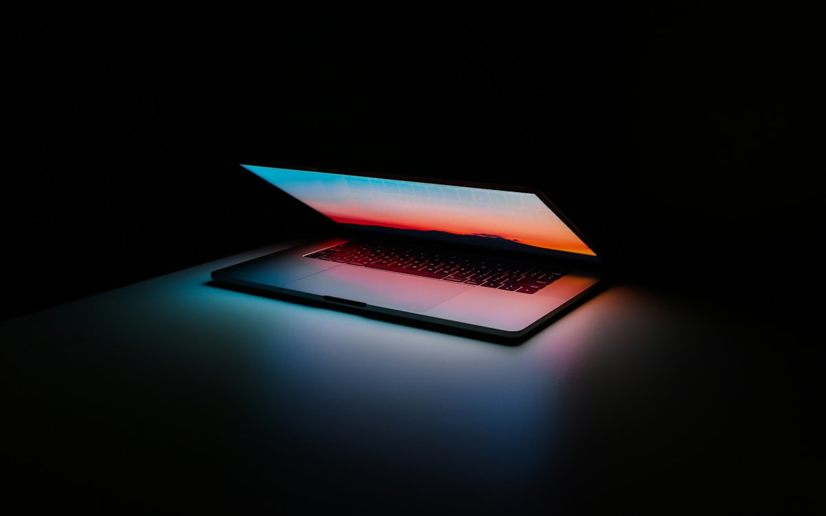 Clean desk with a laptop ready to become a fullscreen teleprompter